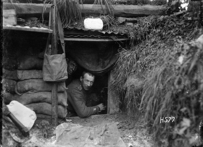 New Zealand soldiers looking out of a dugout during World War I, Hebuterne
