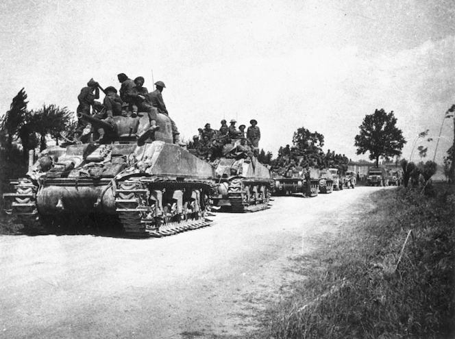 Pritchard, G E, fl 1945 : New Zealand soldiers of B Company, 25th Battalion, on Sherman tanks, San Giorgio, Italy