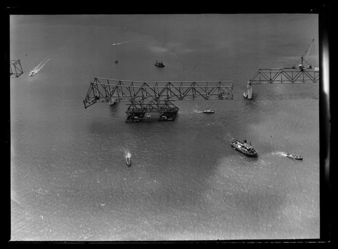 Portions of the span being floated on the Waitemata Harbour during construction of Auckland Harbour Bridge