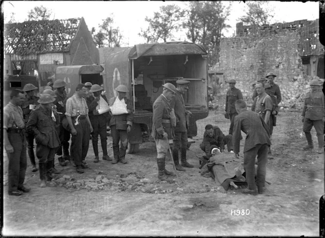 A German medical officer watching the removal of the wounded, World War I