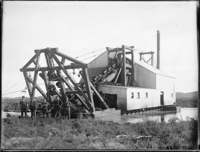 Dredge in use during a drainage project on the the Kaitaia swamp, possibly on the Awanui River