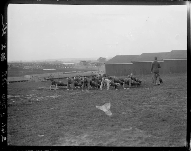 A New Zealand Battalion doing push ups at Sling Camp, England