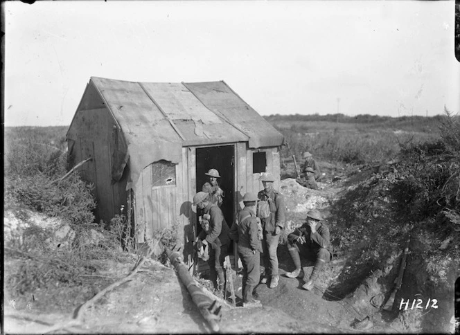 New Zealand troops with captured German hut, Bapaume, France