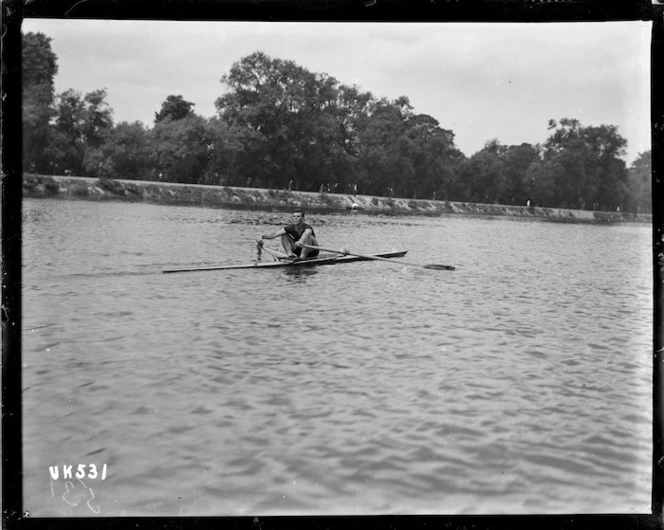 A single sculler rowing at the Royal Henley Peace Regatta, England