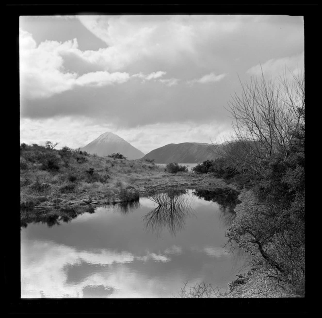 Highway and reflections on Lake Pearson, Arthur's Pass, Selwyn District, Canterbury Region