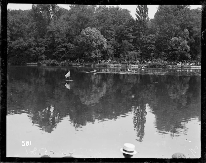 Single sculls approaching the finish line at the Royal Henley Peace Regatta, England