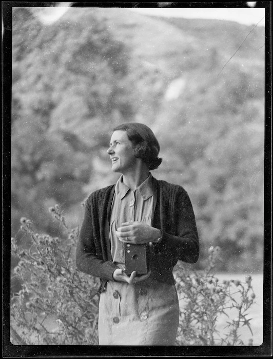 Zeila Wells holding a box camera