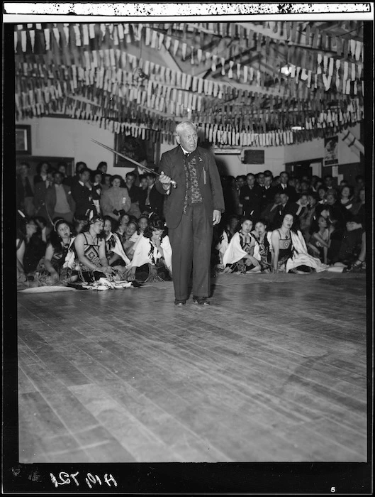 Te Kanapu Haerehuka speaking at a reception given in Sir Peter's honour, Ngati Poneke Hall, Wellington - Photograph taken by W Wilson