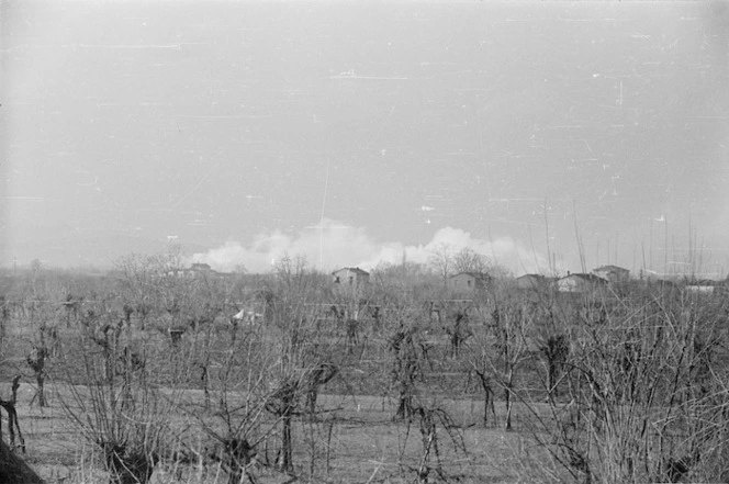 Faenza, Italy, during World War II, with clouds of smoke - Photograph taken by Goerge Frederick Kaye