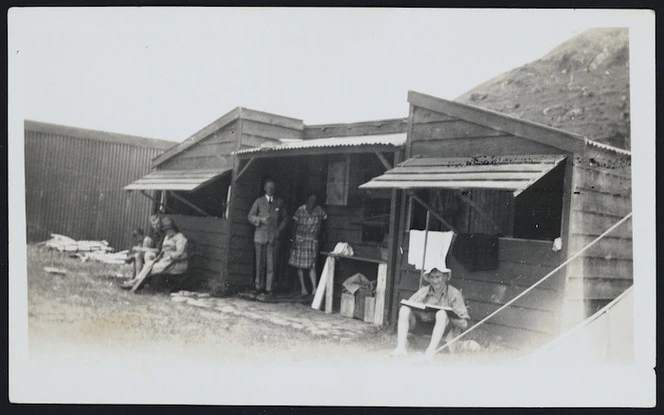 Group outside Bibby family bach at Kairakau Beach, Hawke's Bay