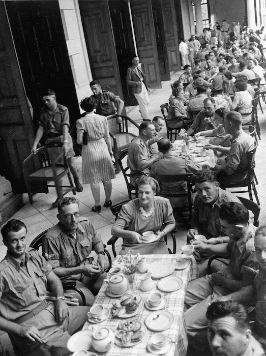 Women of Malaya entertaining troops at the original Anzac Club in Singapore