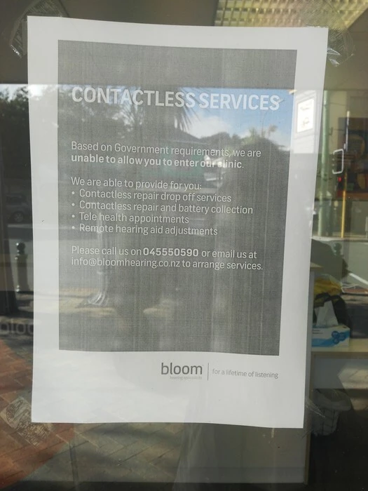 Digital photograph of COVID-19 signage Bloom Hearing Specialists, Newtown