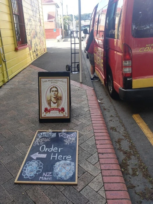 Digital photographs of COVID-19 signage and entrance to Viva Mexico, Newtown