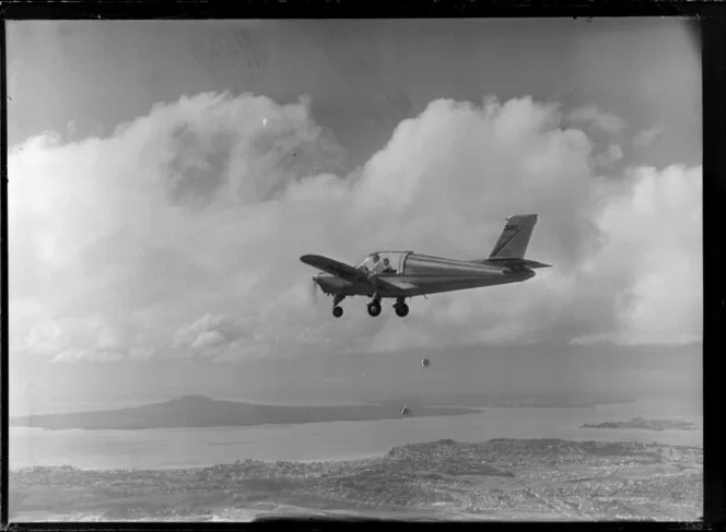 Rallye aircraft flying over Auckland