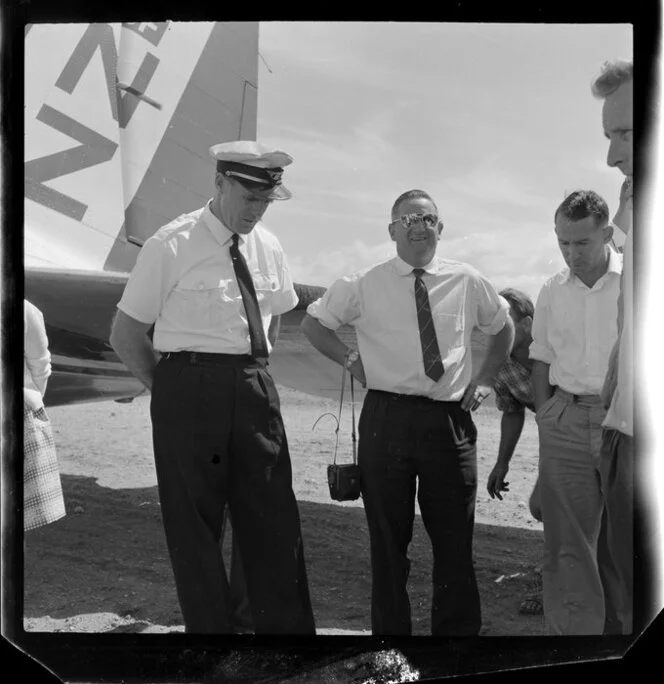 Captain Daniells with unidentified group, Airlines of New Zealand, Taupo