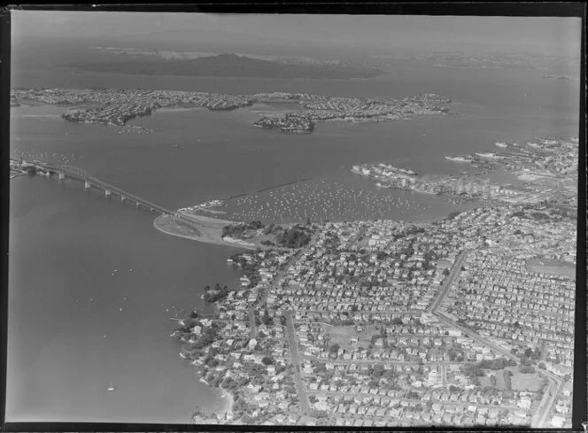 General view of Auckland with Harbour Bridge, Westhaven marina and North Shore with Rangitoto