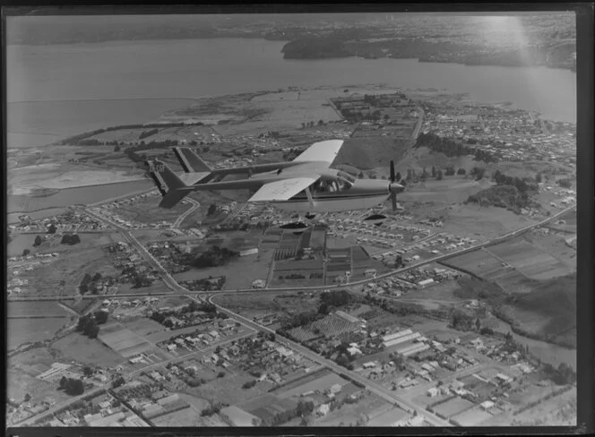 Auckland Aero Club skymaster aeroplane ZK-CGF in flight