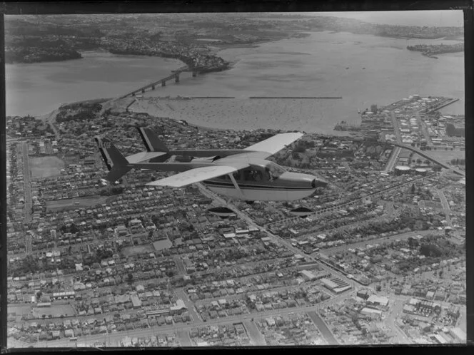 Auckland Aero Club skymaster aeroplane ZK-CGF in flight