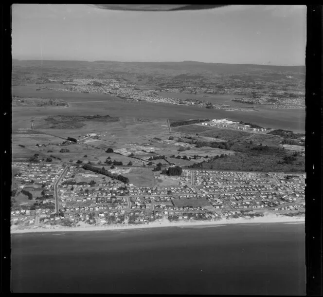 Upper part of Tauranga Harbour, showing fertilizer works and surf beach in foreground