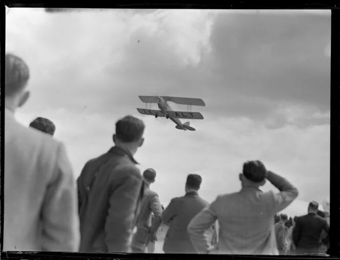 DH Tiger Moth ZK-ALT aircraft in flight, Waikato Aero Club