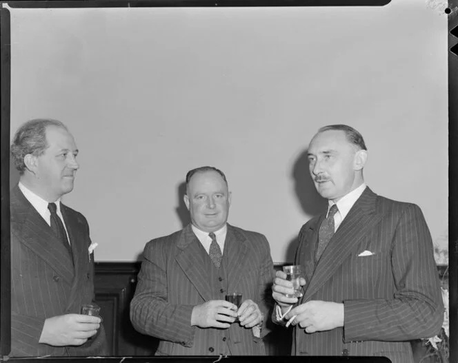 Men at a cocktail party for Mr Lloyd, Central Hotel, location unidentified