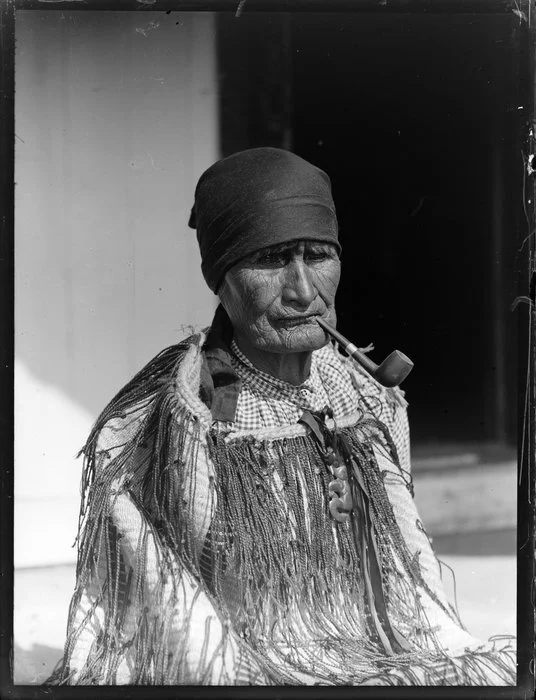 Kuia smoking a pipe, Lake Rotoiti