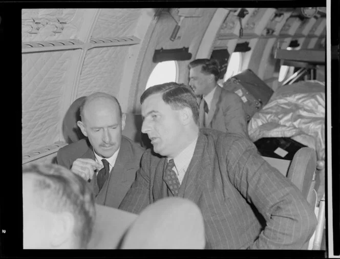 John Gamble, left, with Squadron Leader HG Hazelden, aboard Handley Page Hastings airplane