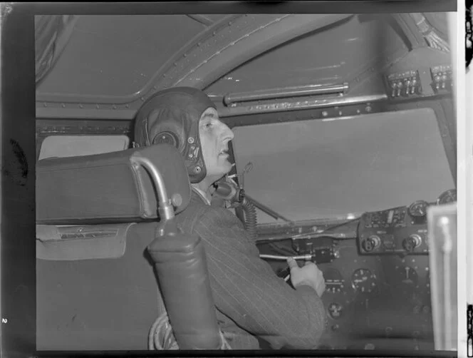 Royal New Zealand Air Force Squadron Leader Hazelden in cockpit of Handley Page Hastings airplane