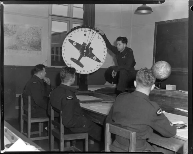 Flight Lieutenant P L D Cummins, navigation instructor taking class on a refresher course, Wigram, Christchurch