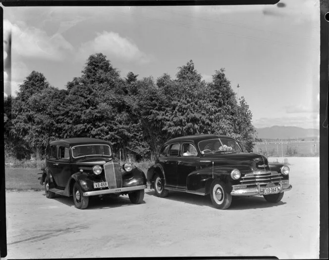 (Left) 1937 Austin? licence plate v3-459, (Right) 1947 Chevrolet, Hamilton Taxi, licence plate T3-364