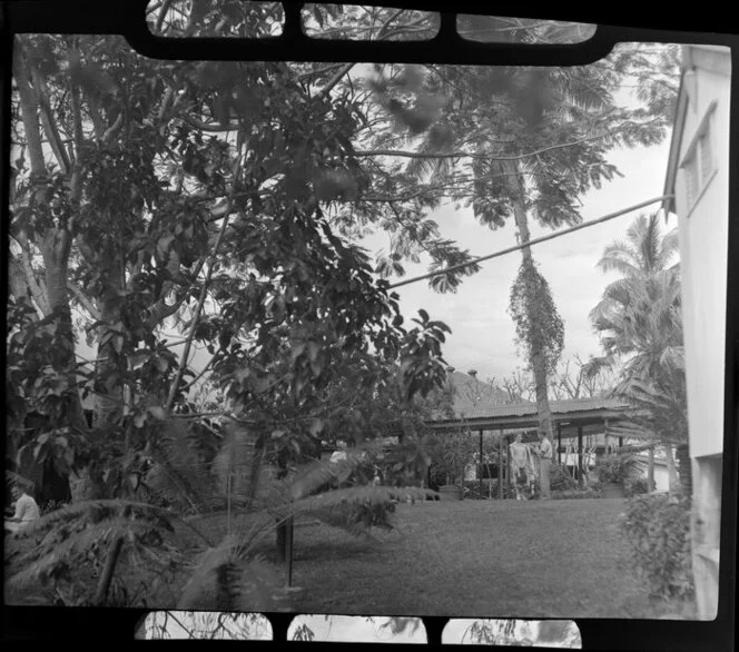 Two unidentified people outside [Northern Hotels], Ba, Fiji