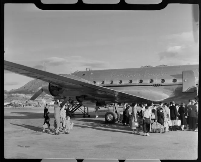 Passengers boarding a Qantas Empire Airways, Kai Tak Airport, Kowloon, Hong Kong