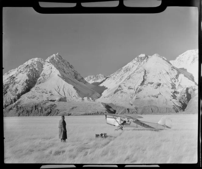 Unidentified man beside Austen aircraft, Mount Cook aerodrome, MacKenzie District