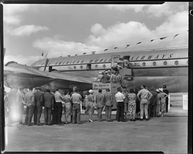 Pan American World Airways, people boarding a Stratocruiser aircraft at Whenuapai Airbase, Auckland