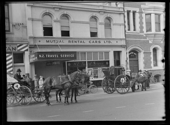 Christchurch Centennial celebrations, horses and buggies outside New Zealand Travel Service office