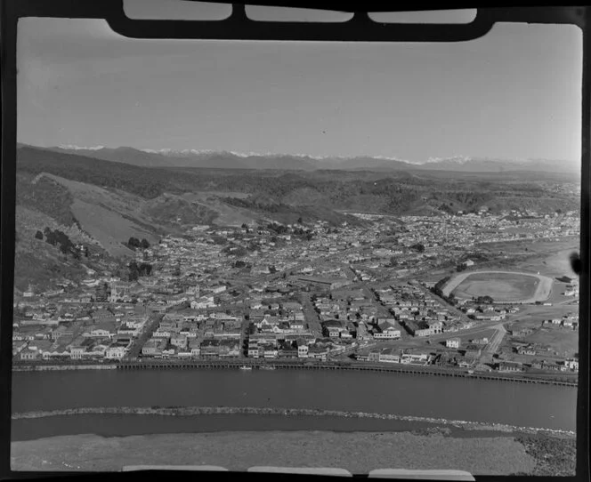 Scenic view of Greymouth, including the Grey River, commercial area and Victoria Park, Grey district, West Coast