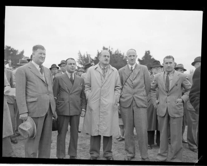 At aerial topdressing trials, from left to right, L T Daniell, Federated Farmers, M Benjamin and H Woodyear Smith, Challenge Phosphate Company, Dr M M Burns, Director of Fertiliser Research, and D A Campbell, Senior Soil Conservator and Secretary of the Soil Conservation Council, organiser of the trials, Masterton