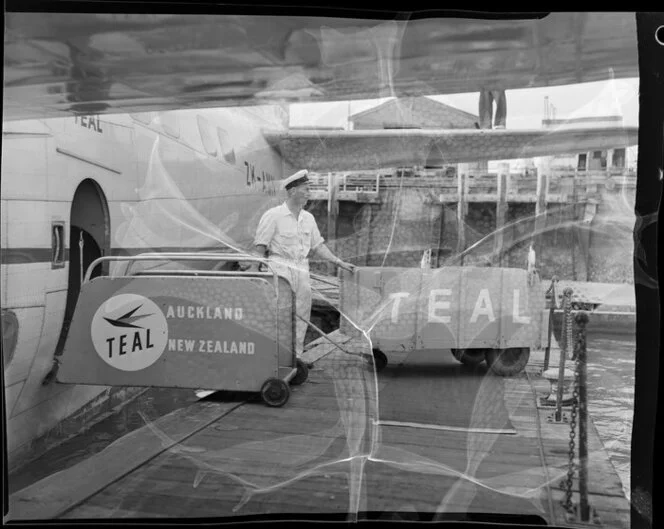 Tasman Empire Airways Ltd, loading freight onto Solent flying boat, Auckland