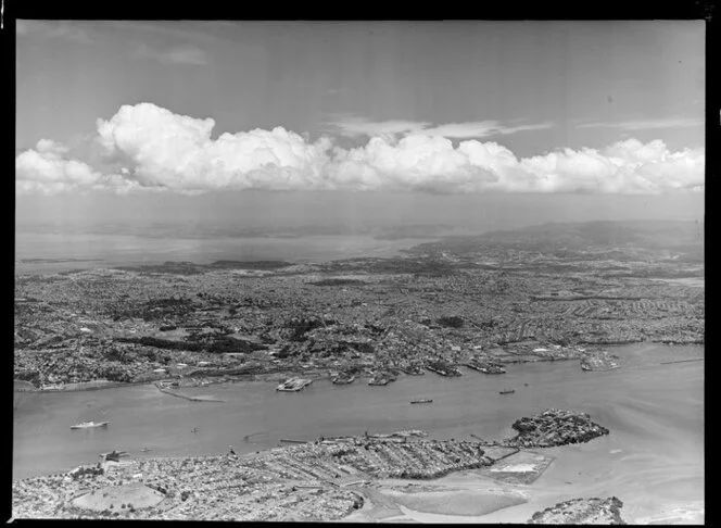 Auckland city from North Shore, showing wharves and harbour