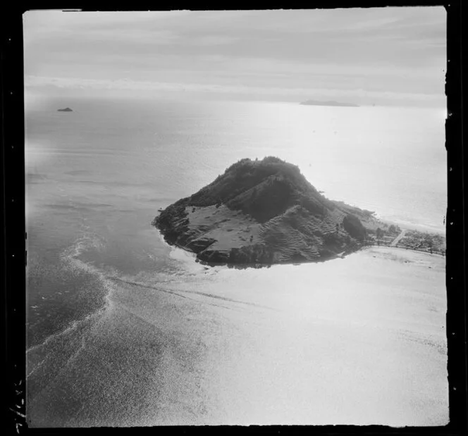 Mt Maunganui, Tauranga, Bay of Plenty, showing view of Mt Maunganui with Adams Avenue and The Mall Road and out to sea to Mayor Island beyond