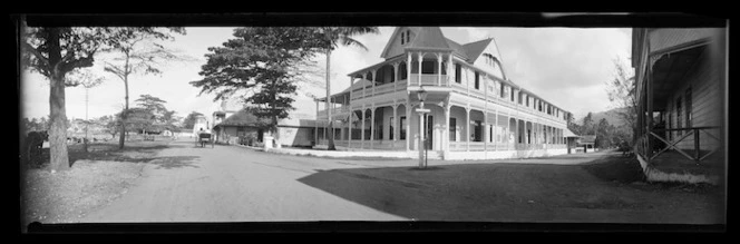 View in Samoa [probably in Apia], showing a T-junction street-scene and a two-storeyed wooden building with open verandahs