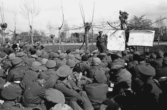 Kaye, George, 1914- : Bernard Cyril Freyberg at a conference of NZ Division officers, outlines the plan for the crossing of the Senio River and subsequent operations, Senio River area, Italy