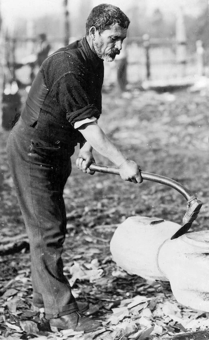 Hori Pukehika working on a wood carving at Christchurch Pa