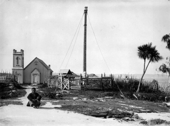 St Faith's Church alongside a pa and Maori flagpole, Ohinemutu