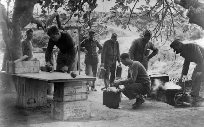 Soldiers of the Royal Air Force in an improvised outdoor kitchen, Greece