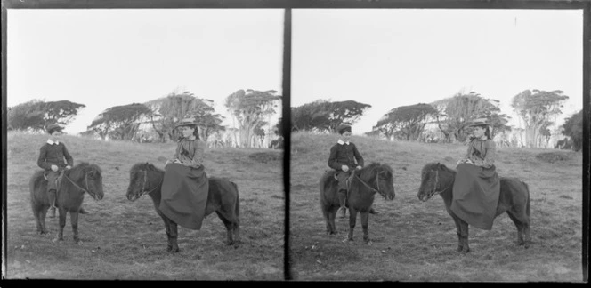 Unidentified girl and boy on ponies (girl riding side-saddle), Catlins area, Clutha District, Otago Region