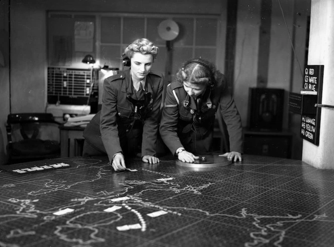 Two members of the Women's Army Auxiliary Corps operating a plotting table