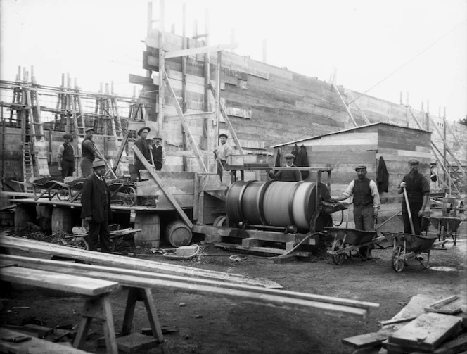 Wanganui local government waterworks, with men working and concrete mixer