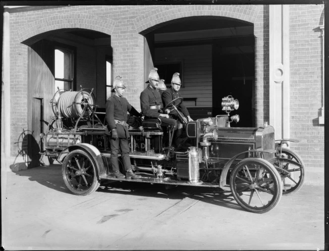 Christchurch Fire Brigade, fire fighters on board a fire truck