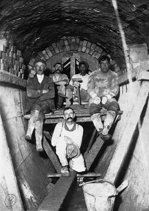 Construction workers in a Auckland Metropolitan Drainage Board sewerage tunnel, at Orakei, Auckland